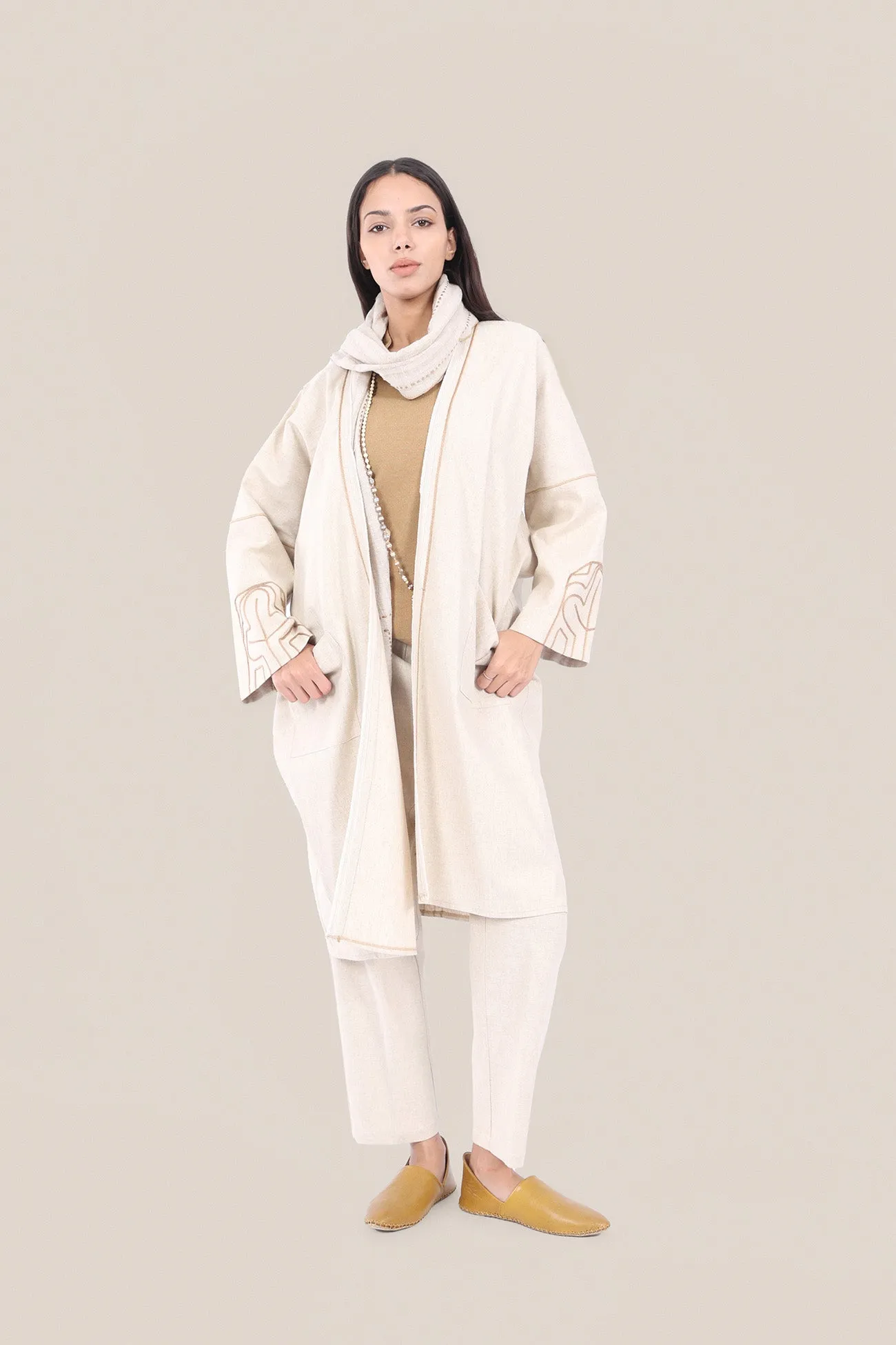 Embroidered coat in linen-cotton blend