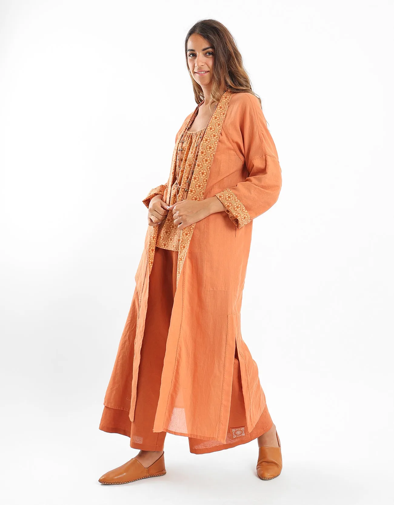 Long coat with a decorative stitch