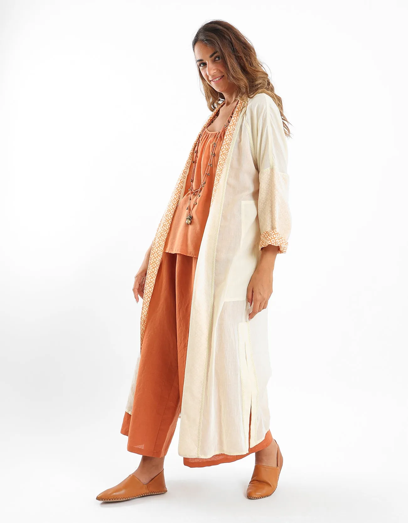 Long coat with a decorative stitch